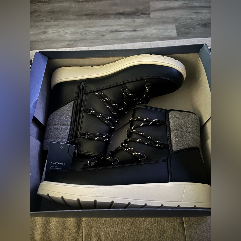 Black and grey water resistant boots for winter